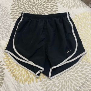Black Nike shorts.